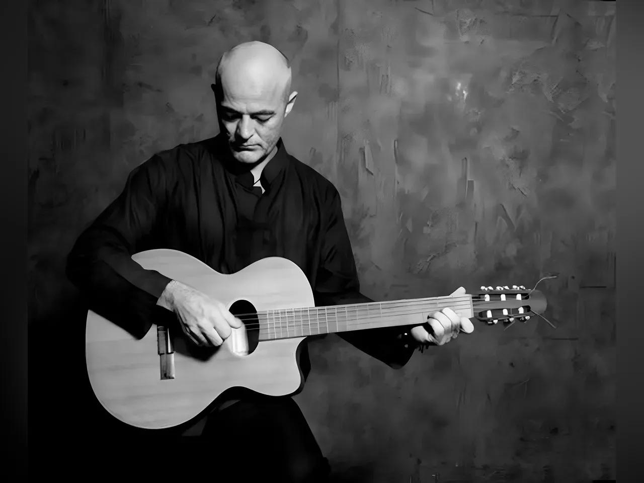 Schwarz-Weiß-Foto von Olli Jahn mir Gitarre