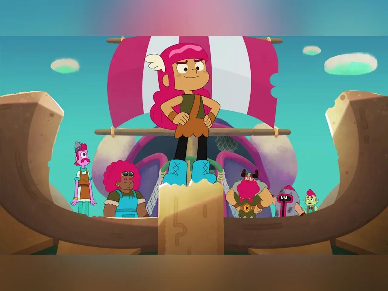 sechs Comicfiguren auf einem Schiff, eine Figur mit pinken langen Haren und herausgestreckter Brust steht mittig vorne.